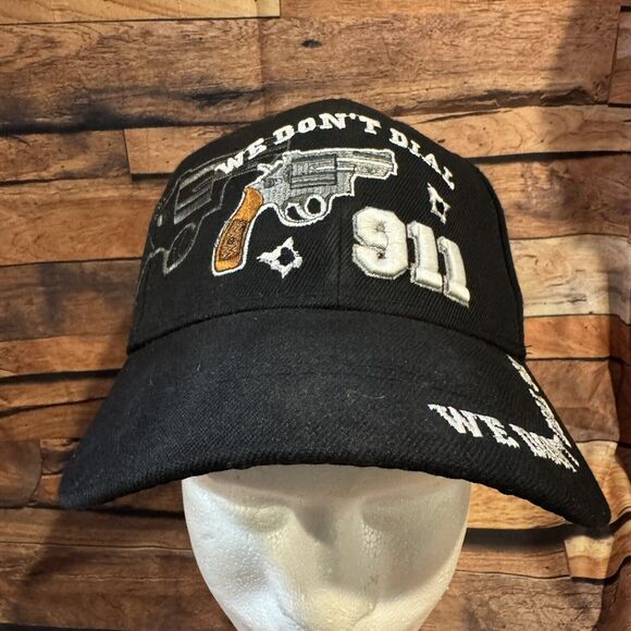 We Don’t Dial 911 Hat Embroidered Black Adjustable Hook & Loop Strapback Cap - Picture 1 of 7